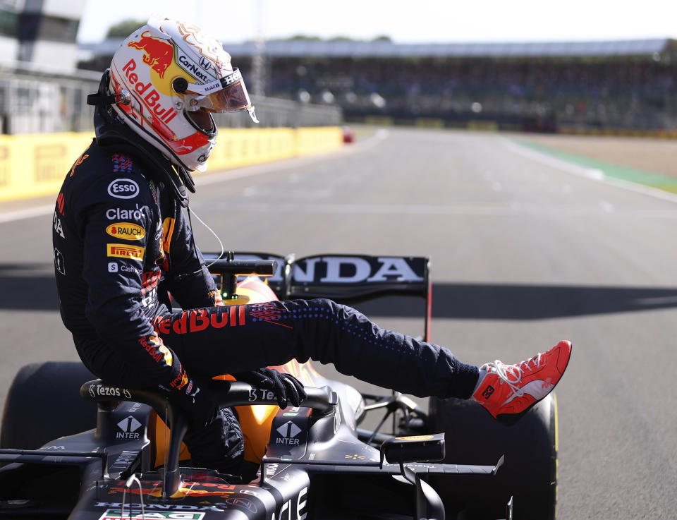 Red Bull driver Max Verstappen of the Netherlands leaves his car after finishing first in the Sprint Qualifying of the British Formula One Grand Prix, at the Silverstone circuit, in Silverstone, England, Saturday, July 17, 2021. The British Formula One Grand Prix will be held on Sunday. (Lars Baron/Pool via AP)