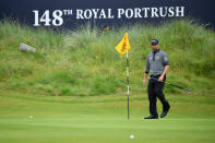 Webb Simpson of the United States takes the flag out of the 18th hole during the first round of the 148th Open Championship held on the Dunluce Links at Royal Portrush Golf Club on July 18, 2019 in Portrush, United Kingdom. (Photo by Stuart Franklin/Getty Images)