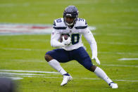 Seattle Seahawks running back Carlos Hyde (30) runs with the ball during the first half of an NFL football game against the Washington Football Team, Sunday, Dec. 20, 2020, in Landover, Md. (AP Photo/Susan Walsh)
