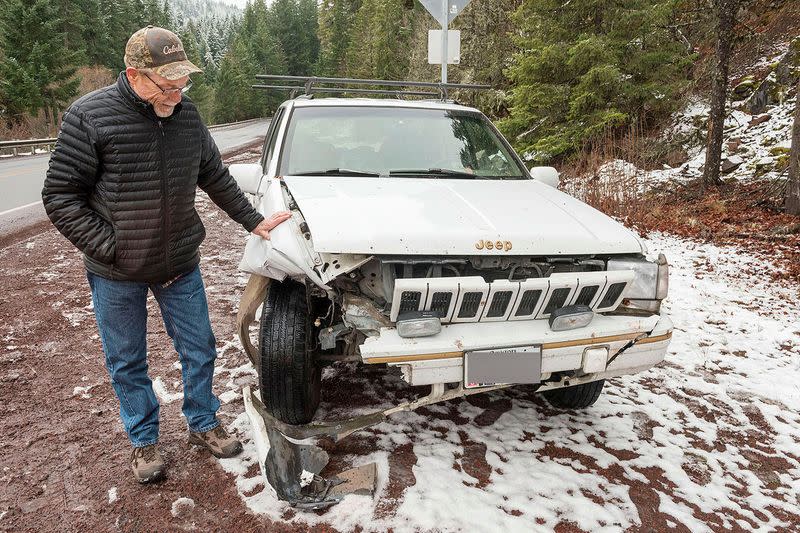 A car damaged by a rock is pictured in Santiam Pass