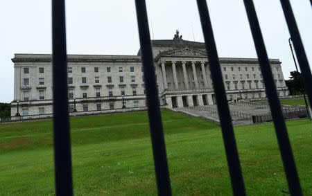 Stormont Castle is seen through a gate in Belfast, Northern Ireland June 28, 2017. REUTERS/Clodagh Kilcoyne