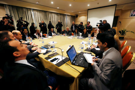 Delegates from the Iran-aligned Houthi movement and the Saudi-backed Yemeni government meet to discuss prisoner swap deal in Amman, Jordan January 17, 2019. REUTERS/Muhammad Hamed