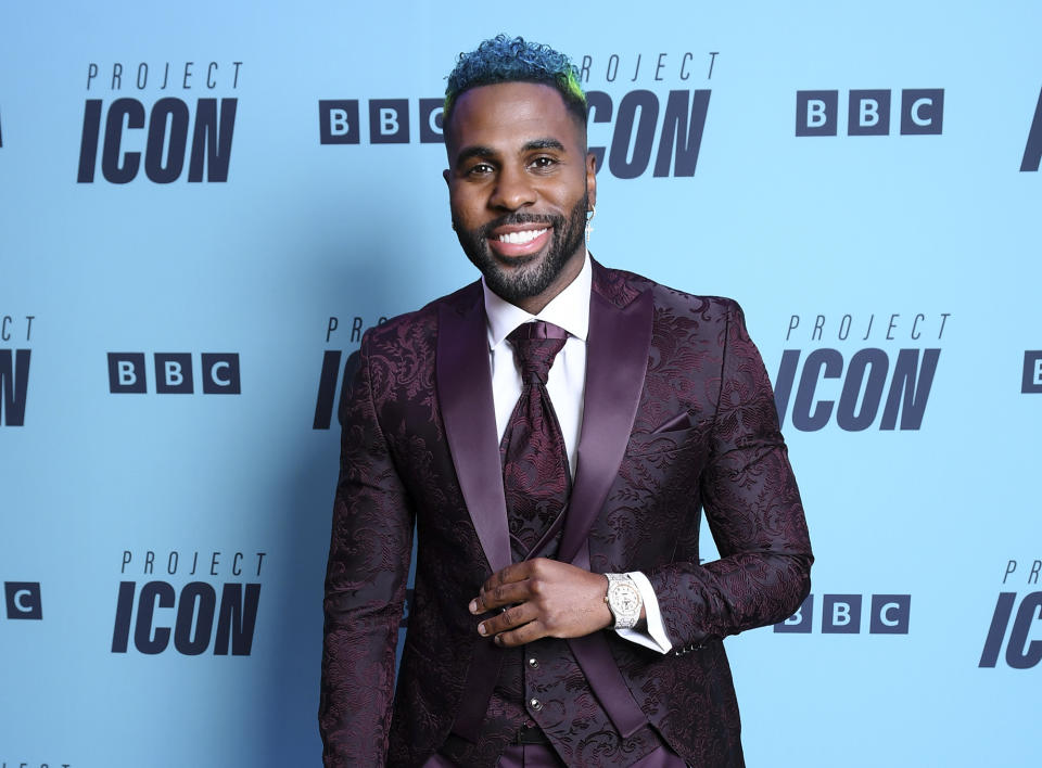 <p>Looking colorful in a purple suit with his neon-dyed hair, <a href="https://people.com/tag/jason-derulo/" rel="nofollow noopener" target="_blank" data-ylk="slk:Jason Derulo;elm:context_link;itc:0;sec:content-canvas" class="link ">Jason Derulo</a> poses at the Project Icon Press Launch in London on March 15.</p>