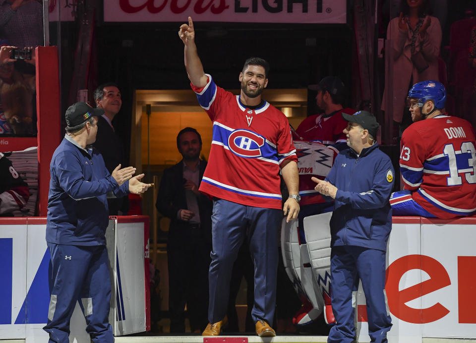 MONTREAL, QC - FEBRUARY 10: Canadian football player Laurent Duvernay-Tardif greets the fans in a ceremony prior to the NHL game between the Montreal Canadiens and the Arizona Coyotes at the Bell Centre on February 10, 2020 in Montreal, Quebec, Canada. (Photo by Francois Lacasse/NHLI via Getty Images)