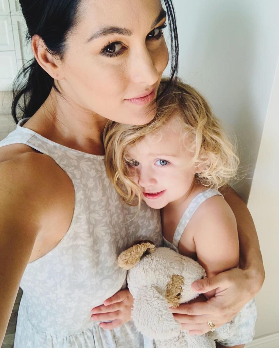 The WWE Divas Champion loves twinning with her baby girl, even though she jokes that Birdie takes after her dad more. "#DaddysMini but I make her my mini," Brie captioned two photos of the pair in pretty patterned ensembles. 