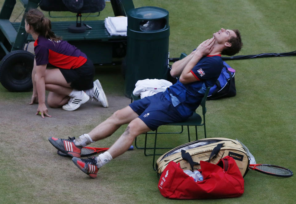 Britain's Andy Murray reacts after winning his men's singles tennis semi-final match against Serbia's Novak Djokovic at the All England Lawn Tennis Club during the London 2012 Olympic Games August 3, 2012. REUTERS/Adrees Latif (BRITAIN - Tags: OLYMPICS SPORT TENNIS) 