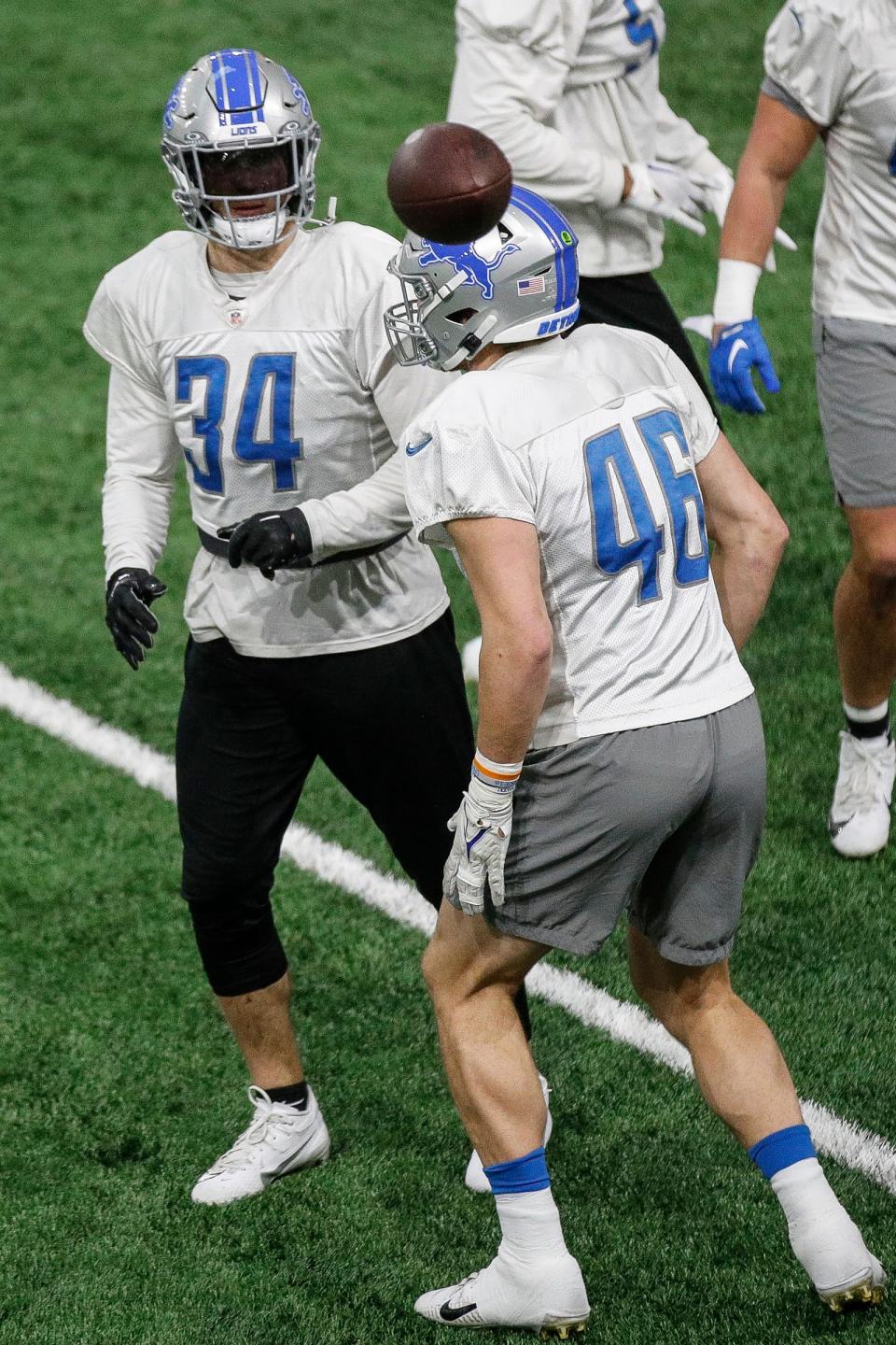 Detroit Lions linebacker Alex Anzalone and linebacker Jack Campbell practice at Detroit Lions headquarters and training facility in Allen Park on Thursday, Jan. 25, 2024.