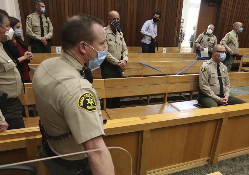 Santa Cruz County Sheriff Jim Hart, seated, right, and many of his senior officers, attend the arraignment on June 12, 2020 of Steven Carrillo for the June 6, 2020, killing of Deputy Sgt. Damon Gutzwiller. (Shmuel Thaler/Santa Cruz Sentinel via AP)