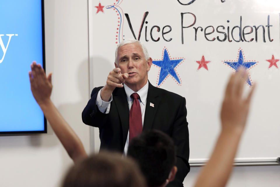 Vice President Mike Pence takes questions from fourth grade students at Thales Academy which reopened to students in Apex, N.C., Wednesday, July 29, 2020. (AP Photo/Gerry Broome)