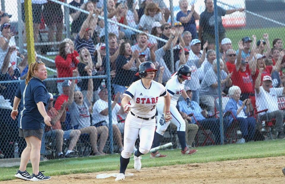 BNL senior Carsyn Alvey rounds first base after clubbing a home run in the seventh inning at the Castle Regional Tuesday night.