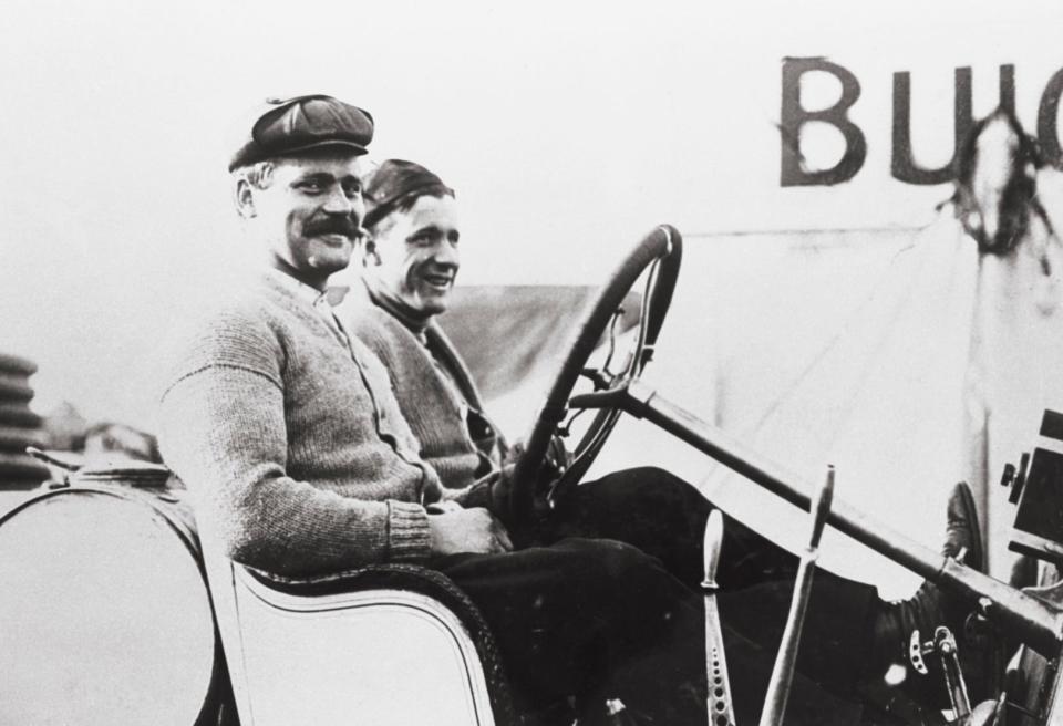 Arthur Chevrolet, brother of the man who co-founded the Chevrolet car company, at the wheel of his Buick race car getting ready for the first running of the Indianapolis 500 in 1911. He failed to finish because of mechanical problems. The on-board mechanic depicted with him is Albert Seraye.