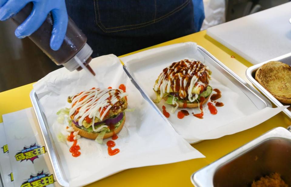 Photo of chef making burgers