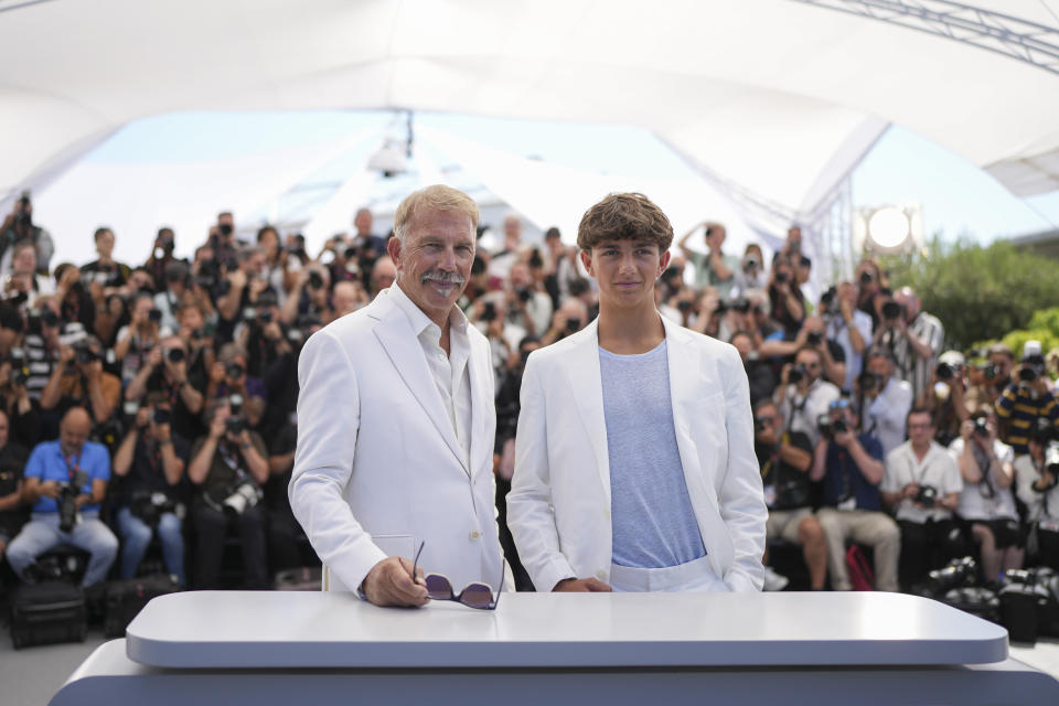 Kevin Costner, left, and Hayes Costner pose for photographers at the photo call for the film 'Horizon: An American Saga' at the 77th international film festival, Cannes, southern France, Sunday, May 19, 2024. (Photo by Scott A Garfitt/Invision/AP)