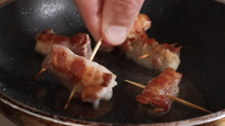 Frying bacon-wrapped oysters