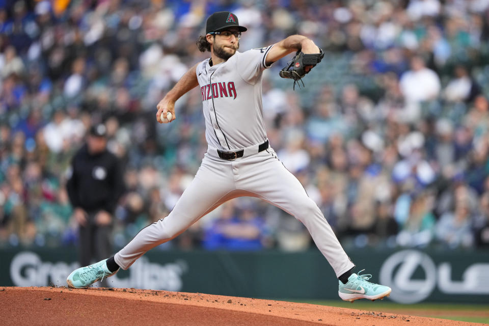 Arizona Diamondbacks starting pitcher Zac Gallen throws to a Seattle Mariners batter during the first inning of a baseball game Friday, April 26, 2024, in Seattle. (AP Photo/Lindsey Wasson)