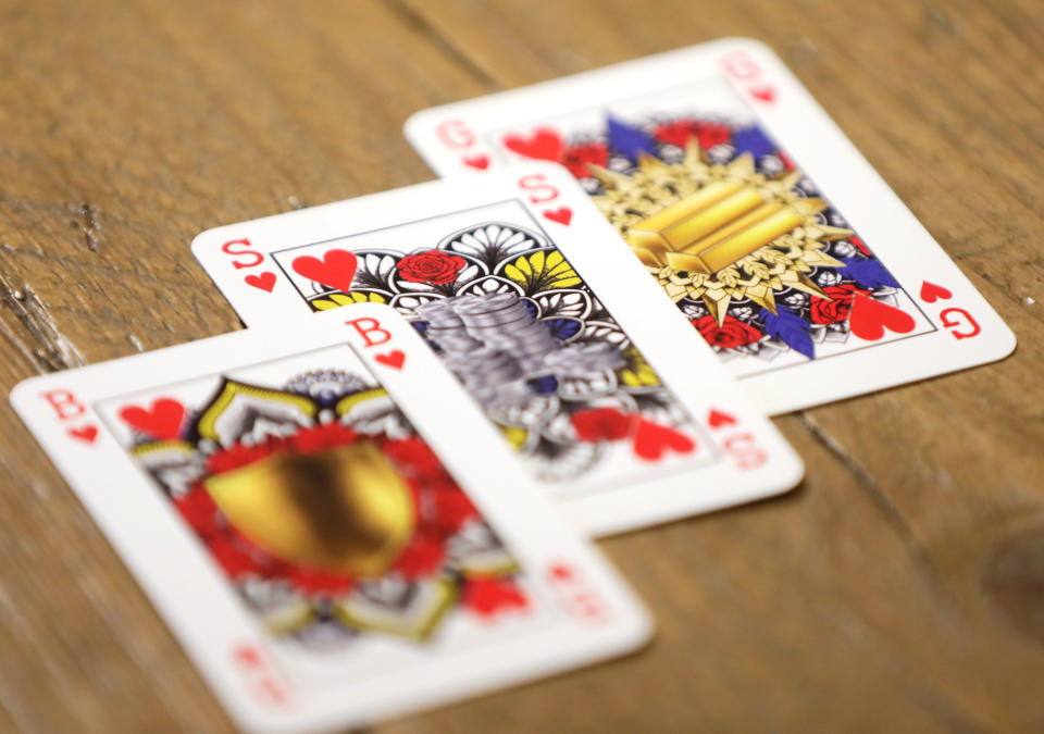 Genderless playing cards designed by Indy Mellink lie on a table in Oegstgeest, Leiden , Netherlands January 15, 2021. Picture taken January 15, 2021. REUTERS/Eva Plevier