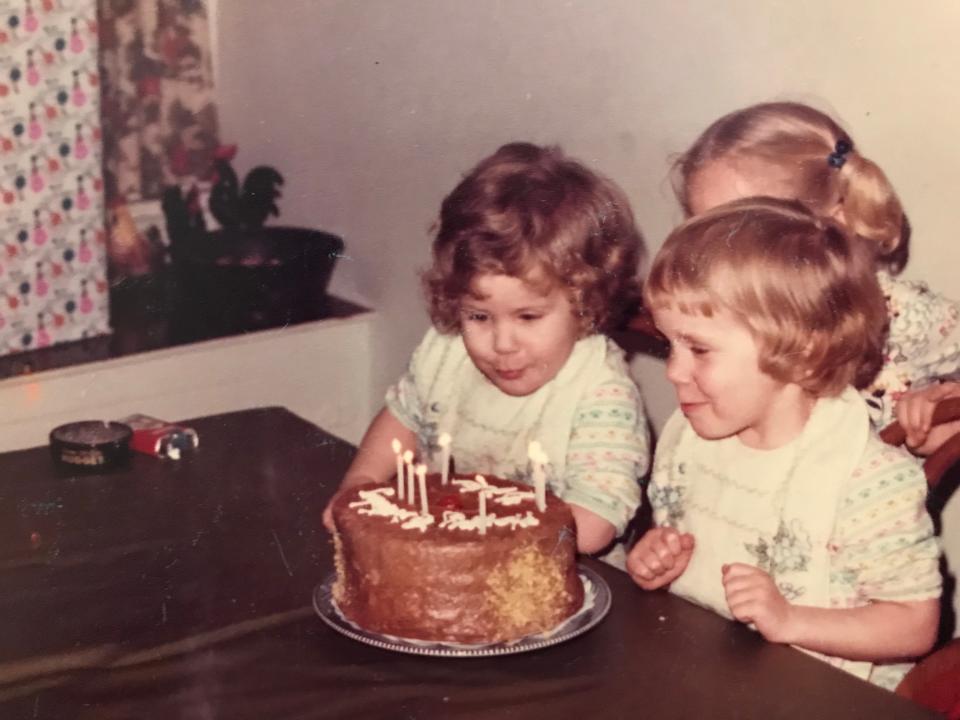 Tonya, Tasha, and their older sister Kimmie celebrating the twins' last birthday together.