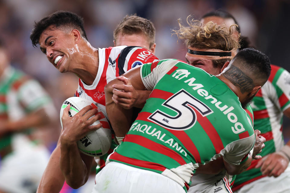 Seen here, Roosters star Joseph Suaalii being tackled during the round three match against South Sydney in the NRL. 