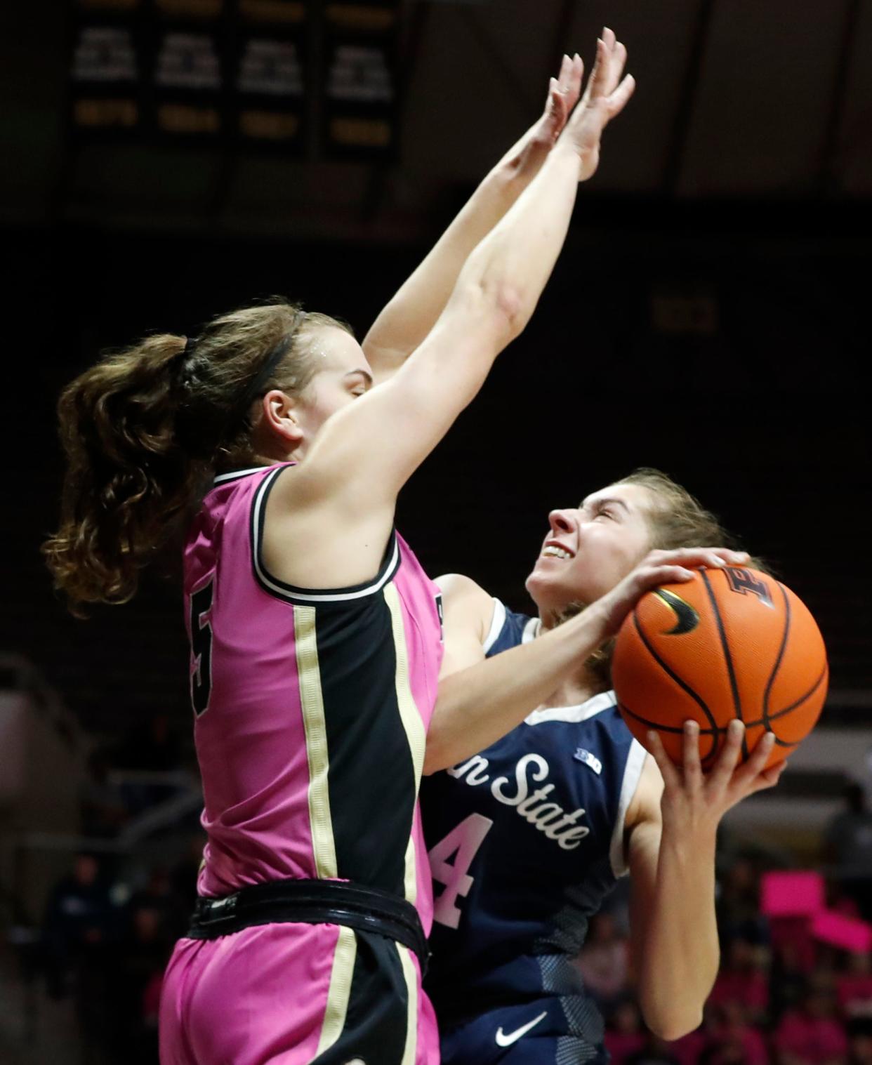 Purdue Boilermakers guard Cassidy Hardin (5) defends the shot of Penn State Nittany Lions guard Shay Ciezki (4) during the NCAA women’s basketball game, Wednesday, Feb. 22, 2023, at Mackey Arena in West Lafayette, Ind. 