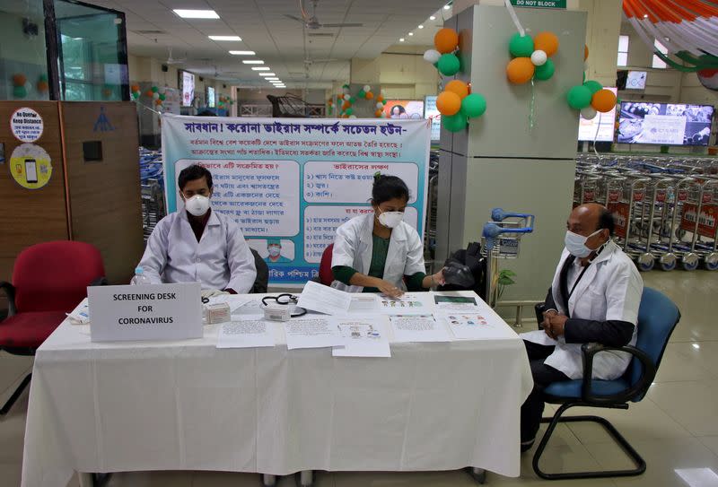 FILE PHOTO: A health desk is set up to screen travelers for signs of the coronavirus at Maharaja Bir Bikram Airport in Agartala