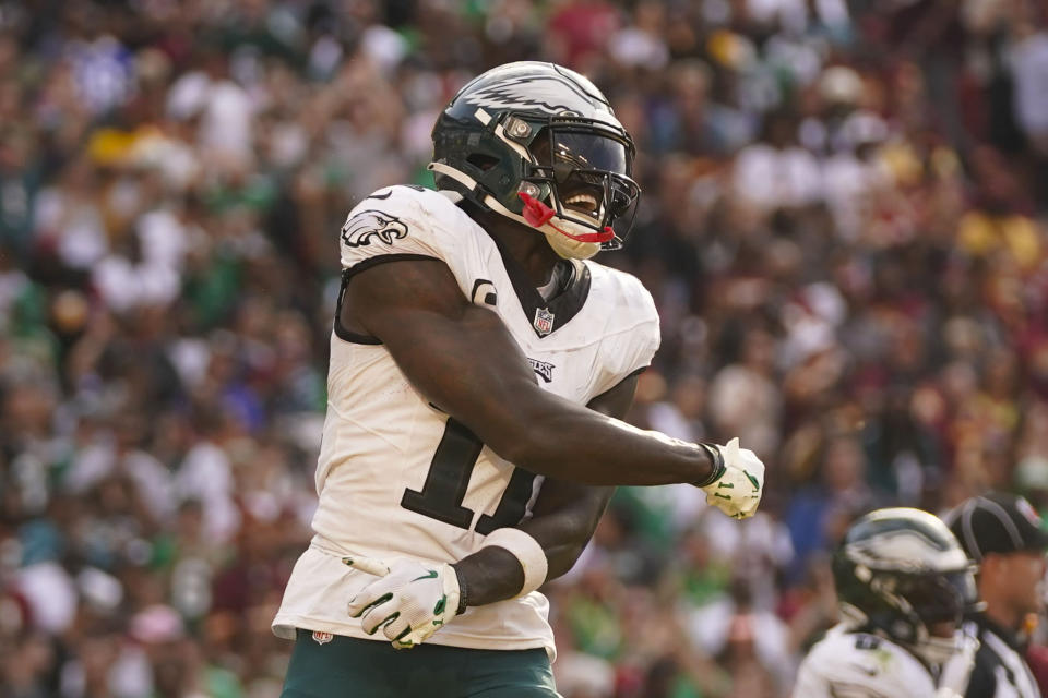 Philadelphia Eagles wide receiver A.J. Brown (11) celebrating his team's touchdown to take the lead against the Washington Commanders during the second half of an NFL football game, Sunday, Oct. 29, 2023, in Landover, Md. (AP Photo/Alex Brandon)