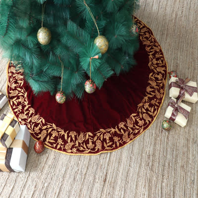 <p><a href="https://go.redirectingat.com?id=74968X1596630&url=https%3A%2F%2Fwww.novica.com%2Fp%2Fembroidered-burgundy-velvet-holiday-tree-skirt%2F409191%2F&sref=https%3A%2F%2Fwww.womansday.com%2Fhome%2Fdecorating%2Fg45446477%2Fbest-christmas-tree-skirts%2F" rel="nofollow noopener" target="_blank" data-ylk="slk:Shop Now;elm:context_link;itc:0;sec:content-canvas" class="link ">Shop Now</a></p><p>Embroidered Burgundy Velvet Holiday Tree Skirt</p><p>novica.com</p><p>$53.99</p><span class="copyright">Novica</span>