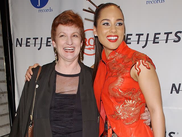 <p>Frank Micelotta/Getty</p> Alicia Keys and her mother Terria Joseph arrive to Clive Davis' pre-Grammy Gala on February 22, 2003 in New York City.