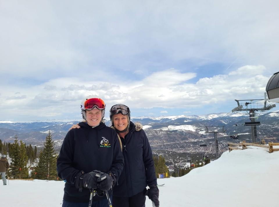 Aubrie skiing with her mother, Claire after surviving the accident