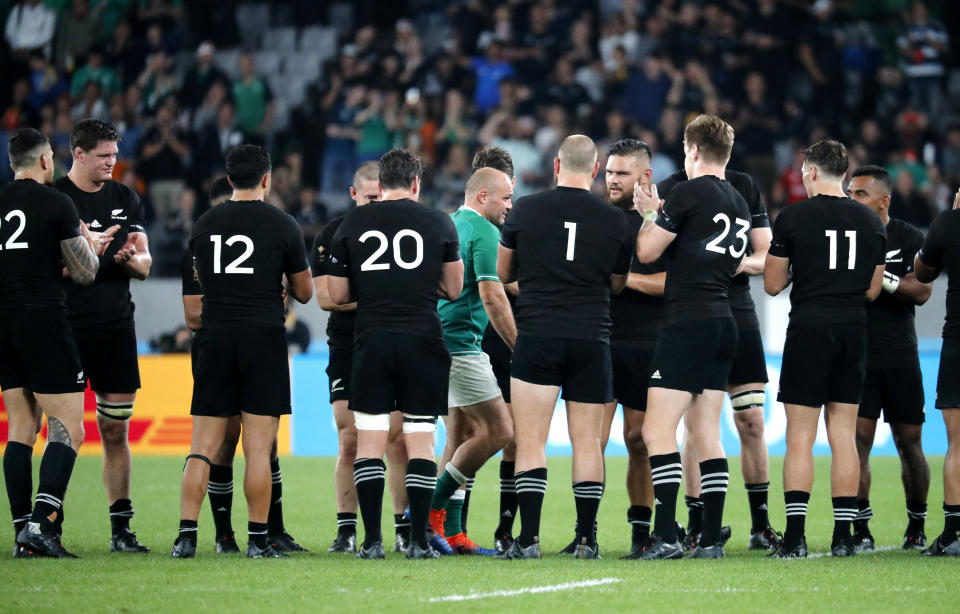 Ireland's Rory Best is given a send-off by New Zealand's players after the Rugby World Cup quarterfinal match at Tokyo Stadium in Tokyo, Japan, Saturday, Oct. 19, 2019. (AP Photo/Eugene Hoshiko)