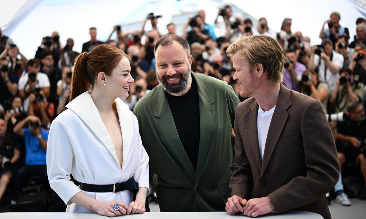 <span>Kinds of Kindness director Yorgos Lanthimos, centre, with actors Emma Stone and Jesse Plemons, 18 May 2024. </span><span>Photograph: Loïc Venance/AFP/Getty Images</span>