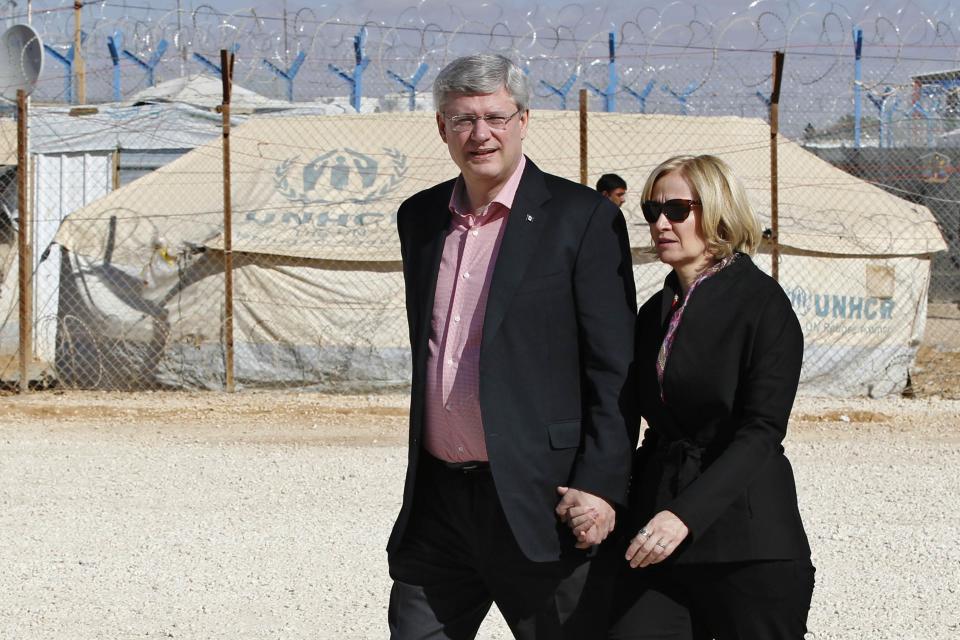 Canada's PM Harper and wife Laureen take tour at center of World Food Program during visit to Al Zaatari refugee camp, in Mafraq