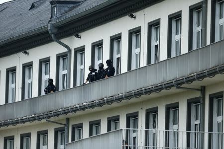 Special police secures the area before a helicopter carrying twenty-year-old Iraqi Ali B. lands in Wiesbaden, Germany, June 9, 2018, after his arrest by police in the Kurdistan region of Iraq, admitting to the rape and murder of Susanna F., a 14-year-old German girl. REUTERS/Ralph Orlowski