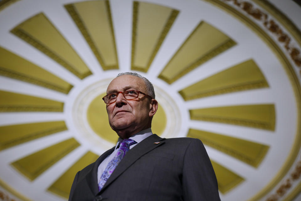 Senate Majority Leader Charles Schumer seen against the ceiling of the Cupola of the U.S. Capitol.