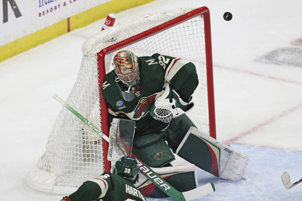 Minnesota Wild goaltender Filip Gustavsson (32) defends the net against the Dallas Stars during the first period of Game 4 of an NHL hockey Stanley Cup first-round playoff series Sunday, April 23, 2023, in St. Paul, Minn. (AP Photo/Stacy Bengs)