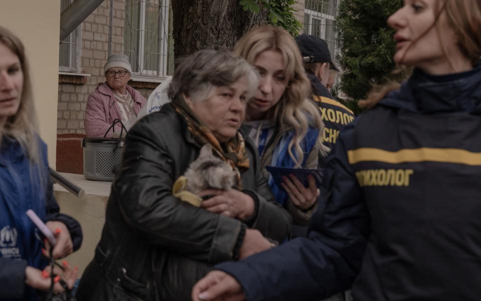 Civilians being evacuated from their homes in  Vovchansk amid Russian cross-border attacks