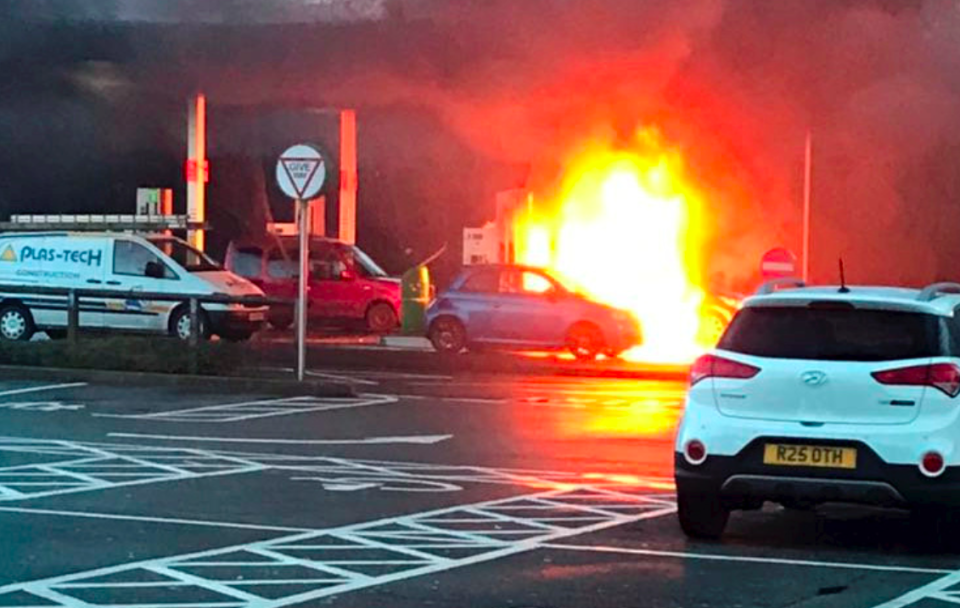 <em>The Smart car turned into a fireball on the petrol forecourt (SWNS)</em>