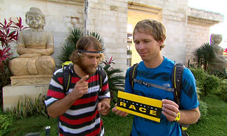 Snowboarders Andy and Tommy puzzle over another "Race" clue (CBS)