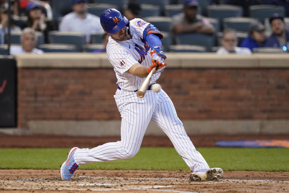 New York Mets' Pete Alonso hits a two-run single during the third inning of the team's baseball game against the Chicago Cubs on Tuesday, June 15, 2021, in New York. (AP Photo/Frank Franklin II)