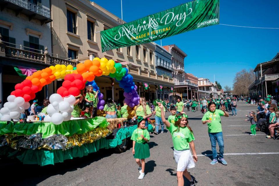 A rainbow float from Simp’s Junk Removal makes it way down Front Street during the St. Patrick’s Day parade in Old Sacramento on Saturday.