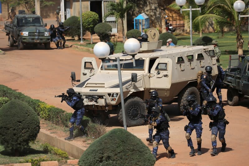 Soldiers from Burkina Faso participate in a simulated raid during the U.S. sponsored Flintlock exercises in Ouagadougou, Burkina Faso