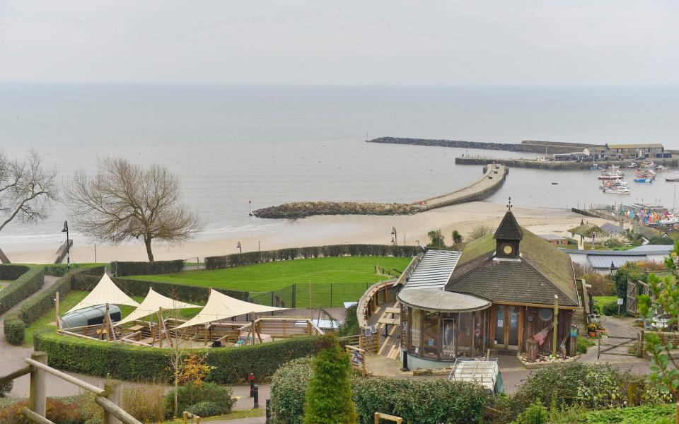 The space outside Mr Hix's Oyster and Fish House offers panoramic sea views in the Dorset coastal town - BNPS