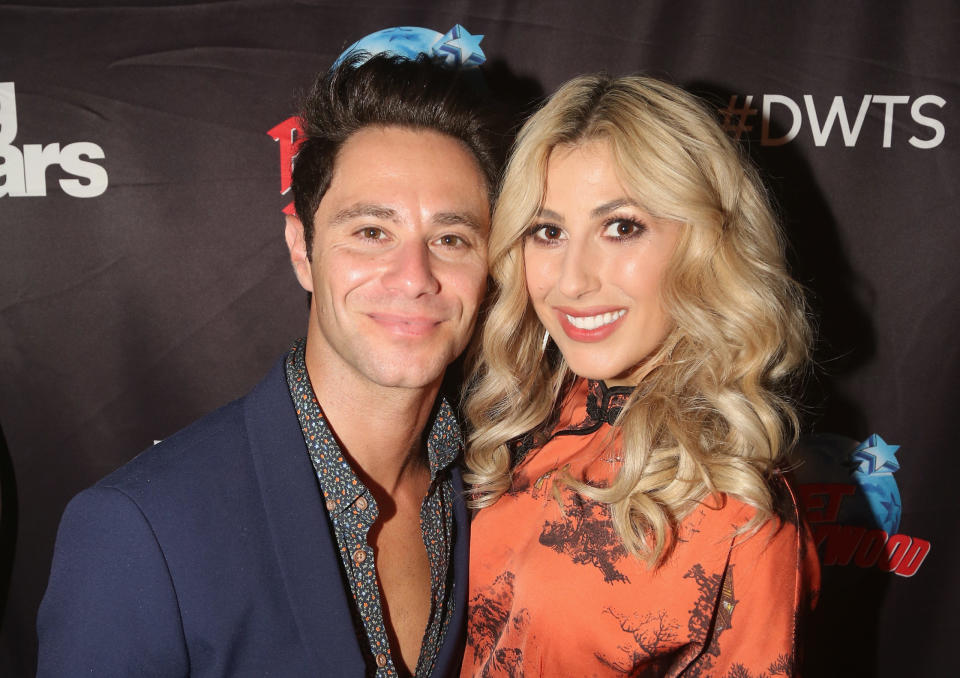 Sasha Farber and wife Emma Slater pose as the “Dancing with the Stars: Athletes Season 26” cast visits Planet Hollywood Times Square on April 13, 2018 in New York City. (Photo by Bruce Glikas/FilmMagic)