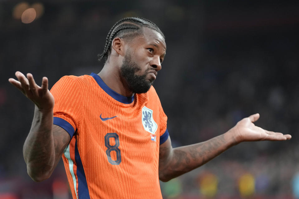 FILE - Netherlands' Georginio Wijnaldum celebrates after scoring his side's second goal during an international friendly soccer match between Netherlands and Scotland at the Johan Cruyff ArenA, in Amsterdam, Netherlands, Friday, March 22, 2024. (AP Photo/Peter Dejong, File)