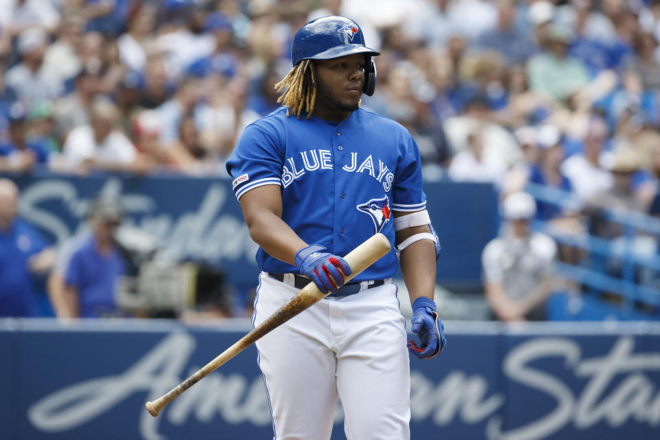 TORONTO, ON - AUGUST 11: Vladimir Guerrero Jr. #27 of the Toronto Blue Jays takes his at bat in the ninth inning of MLB action against the New York Yankees at Rogers Centre on August 11, 2019 in Toronto, Canada. (Photo by Cole Burston/Getty Images)