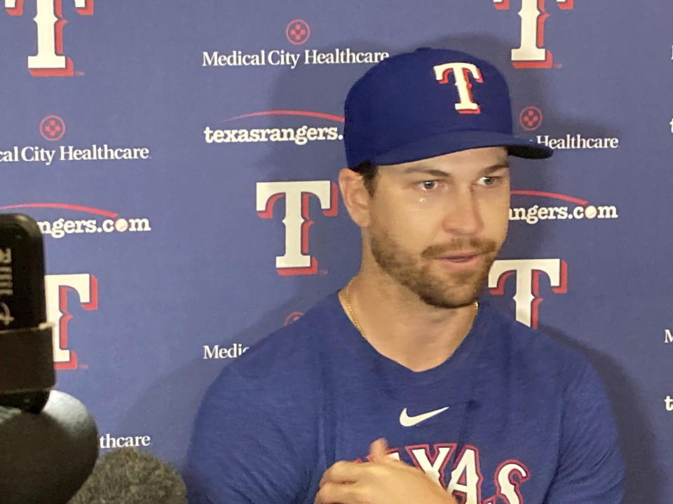 Texas Rangers pitcher Jacob deGrom speaks to the media during a baseball news conference in Arlington, Texas, Tuesday, June 6, 2023. DeGrom will have season-ending Tommy John surgery, cutting short his first season after the oft-injured right-hander signed a $185 million, five-year contract with the AL West-leading Rangers. (AP Photo/Stephen Hawkins)