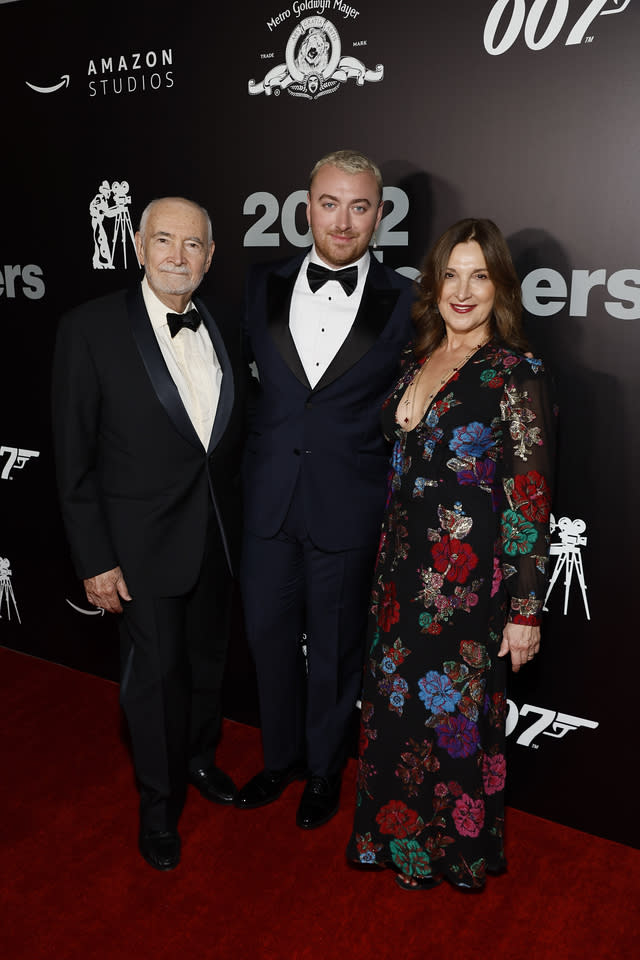 Sam Smith, center, with honorees Michael G. Wilson and Barbara Broccoli - Credit: Ryan Miller/Capture Imaging