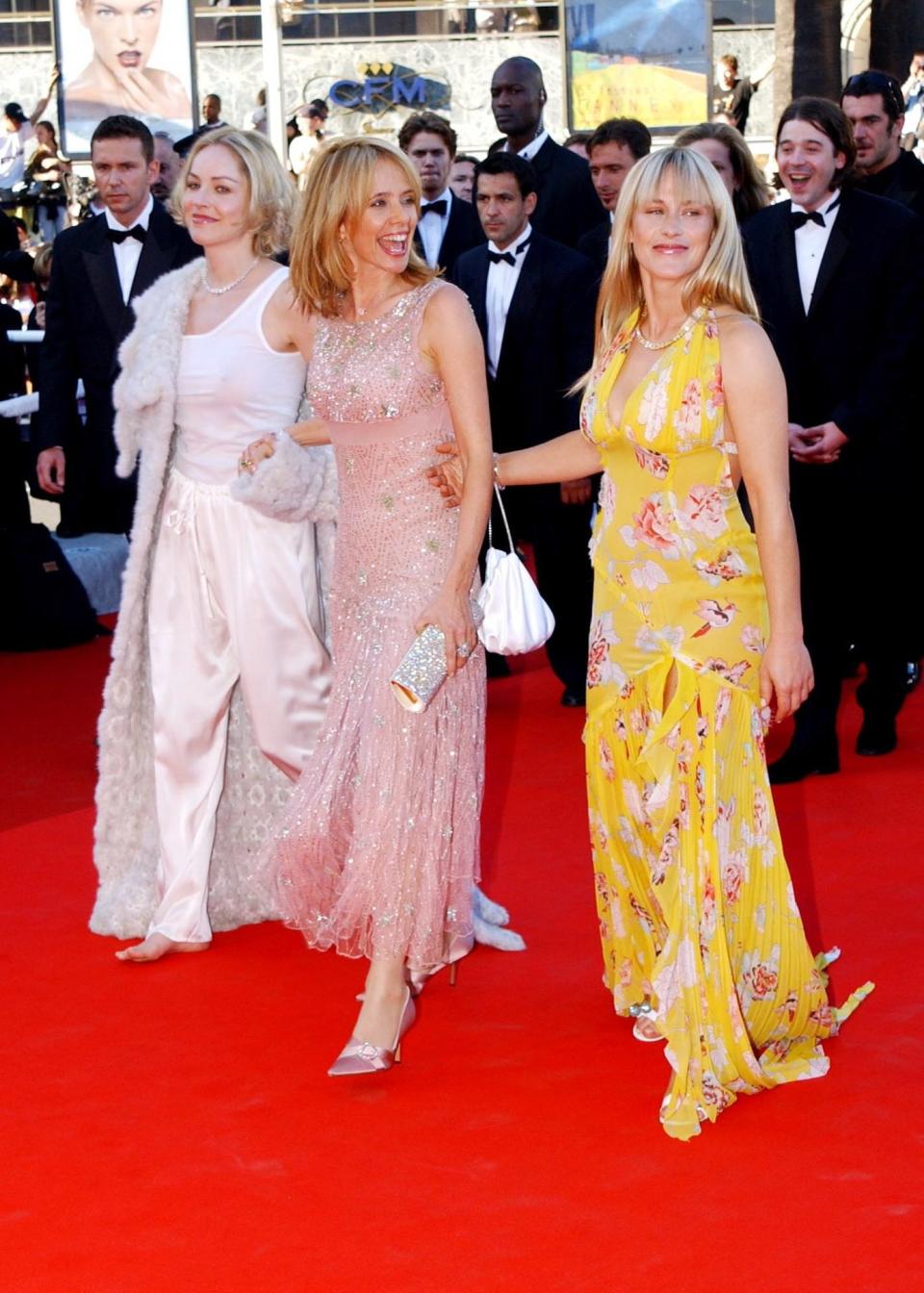 From left to right:  Sharon Stone and Rosanna and Patricia Arquette arrive for the premiere of the documentary film 'Searching for Debra Winger', as part of the 55th Cannes Film Festival at the Palais des Festivals in Cannes.