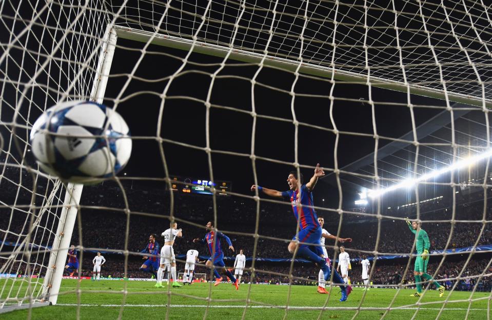 <p>Luis Suarez of Barcelona celebrates as Sergi Roberto of Barcelona scores their sixth goal during the UEFA Champions League Round of 16 second leg match between FC Barcelona and Paris Saint-Germain at Camp Nou on March 8, 2017 in Barcelona, Spain. (Photo by Laurence Griffiths/Getty Images) </p>