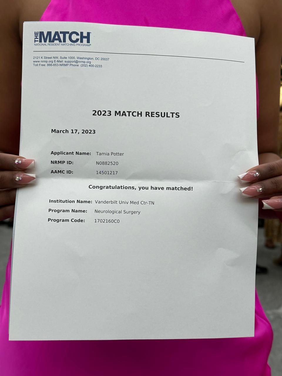 FAMU alumna Tamia Potter, a current student at Case Western Reserve University's School of Medicine, holds up her medical residency match results on March 17, 2023.