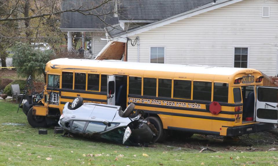 A school bus ran off of Southgate Dr. In New Hempstead, hitting a parked minivan and crashed into a house Dec. 1, 2022. Several people including children were taken to hospitals.